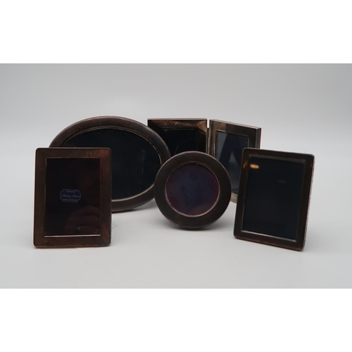 355 - A collection of silver photo frames, including an oval example by Mappin & Webb,&nbsp;17 x 13cm,... 