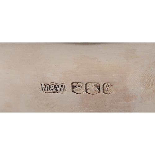 356 - An Elizabeth II silver wine coaster, by Mappin & Webb, Sheffield, with a gadrooned shell border,... 