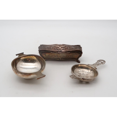 359 - A silver strainer, by Mappin & Webb, London, a small silver quaich, by C T Burrows, Birmingham, ... 