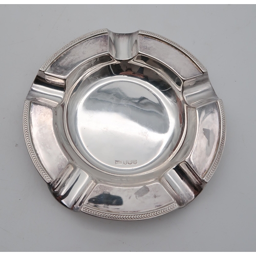 361 - A George V silver ash tray, by Mappin & Webb, Sheffield 1943, and a silver table lighter by Cali... 