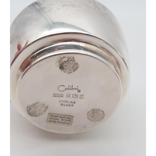 361 - A George V silver ash tray, by Mappin & Webb, Sheffield 1943, and a silver table lighter by Cali... 