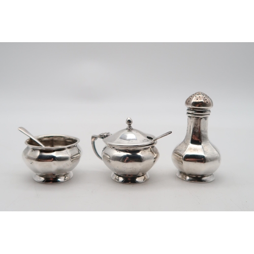 363 - A three piece silver cruet set,&nbsp;comprising a tray, caster, preserve pot and salt, Birmingham, o... 