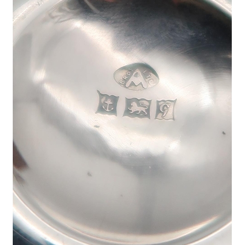 365 - A collection of silver including a pair of silver tastevins, by Adie Brothers Ltd, Birmingham, a sil... 