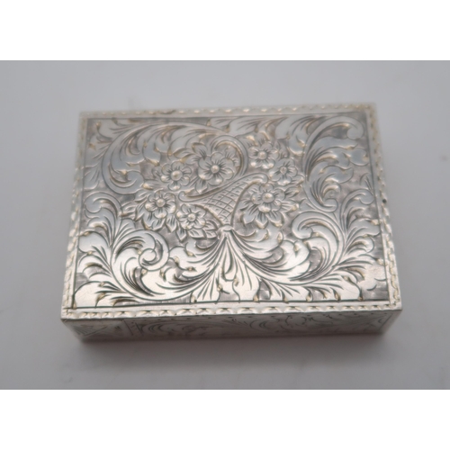 368 - A German silver vanity case, the lid enamelled with a courting scene, the body with engraved scrolli... 