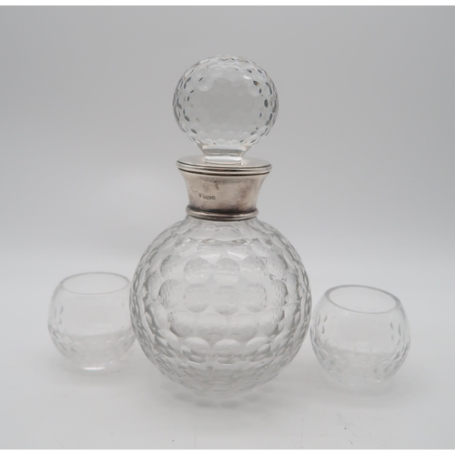 386 - A silver collared cut glass decanter, Birmingham, of spherical form, with cut circular panels, a sil... 