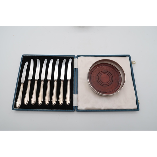 386 - A silver collared cut glass decanter, Birmingham, of spherical form, with cut circular panels, a sil... 