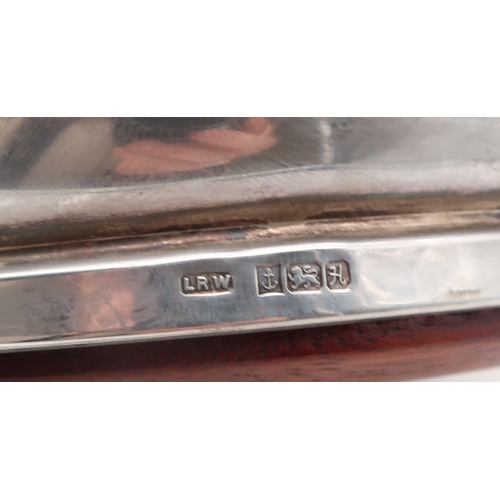 386 - A silver collared cut glass decanter, Birmingham, of spherical form, with cut circular panels, a sil... 