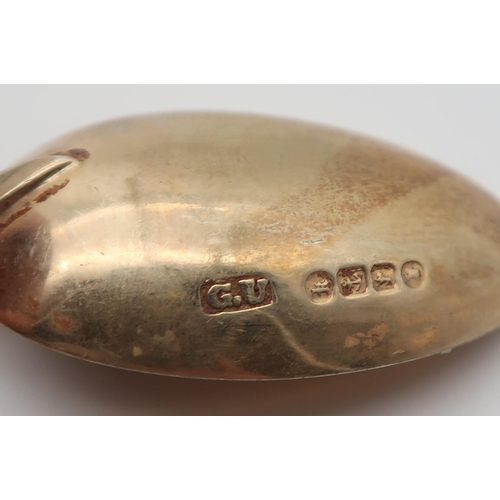 388 - A pair of silver clothes brushes, Birmingham marks, and a set of silver gilt tea spoons and sugar to... 