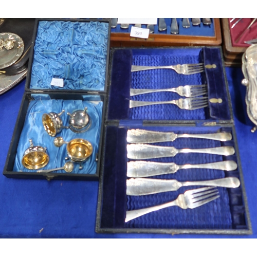 391 - A large collection of EPNS including cased cutlery sets, christening mug, a pair of candelabra, tray... 