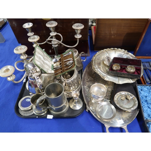 391 - A large collection of EPNS including cased cutlery sets, christening mug, a pair of candelabra, tray... 
