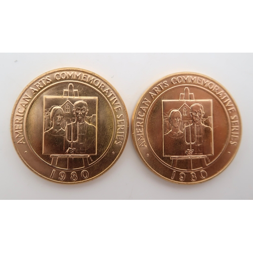AMERICAN ARTS COMMEMORATIVE MEDALLIONS Two 1980 Grant Wood One Ounce Gold Medals.