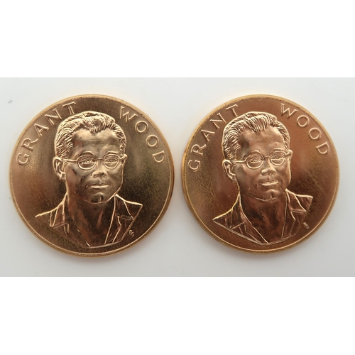 420 - AMERICAN ARTS COMMEMORATIVE MEDALLIONS Two 1980 Grant Wood One Ounce Gold Medals.The obverse design ... 