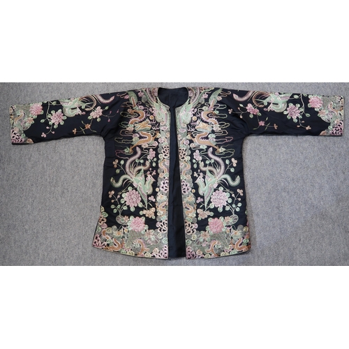 212 - A Chinese embroidered jacket, another jacket in brown, assorted beaded handbags, gloves etc