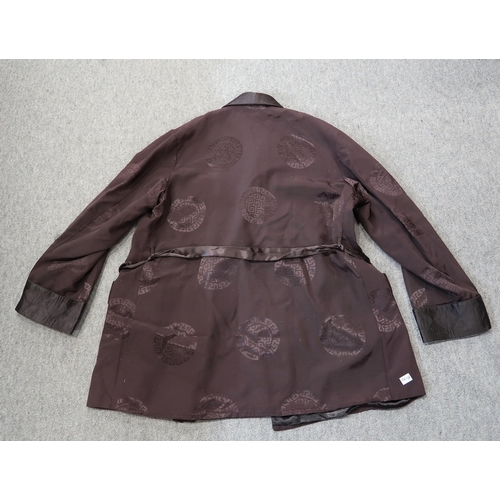 212 - A Chinese embroidered jacket, another jacket in brown, assorted beaded handbags, gloves etc