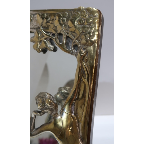 262 - A WMF style 'Echo' Art Nouveau style brass framed mirror