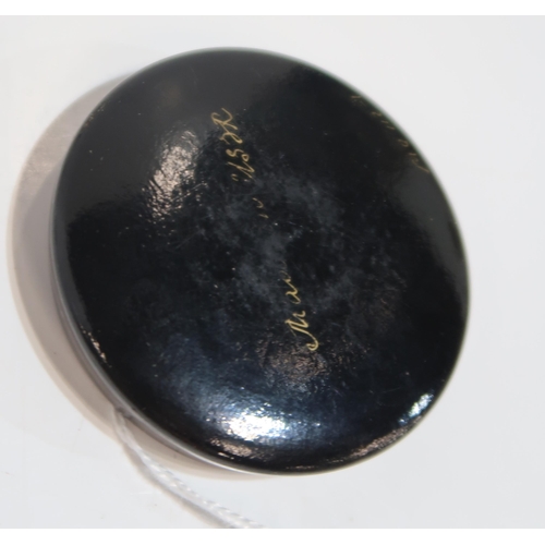 265 - A Russian circular box, painted with the portrait of a child, a Herend green dolphin, a red fish, a ... 