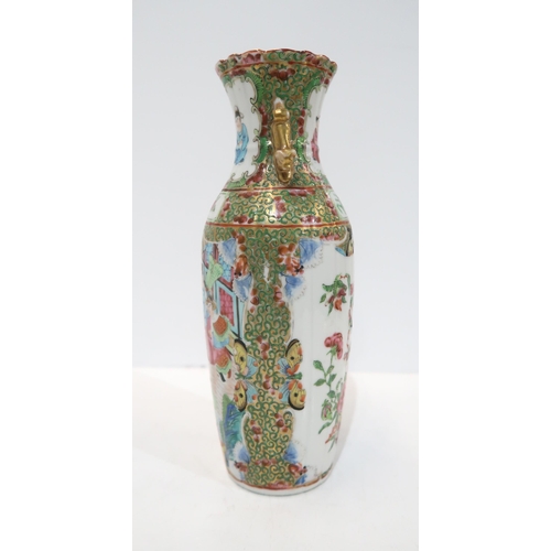 275 - A Chinese famille rose baluster vase, the body fluted, with a shaped rim and applied gilt handles, d... 
