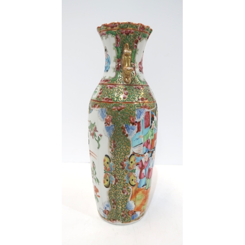 275 - A Chinese famille rose baluster vase, the body fluted, with a shaped rim and applied gilt handles, d... 