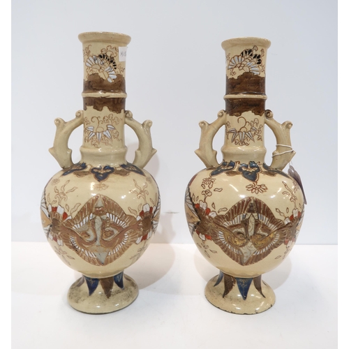 276 - A pair of Japanese stoneware vases, of bottle form, decorated with birds and foliage, 31cm high (2)