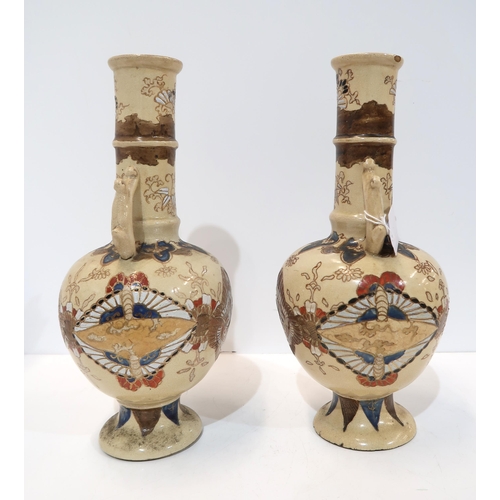 276 - A pair of Japanese stoneware vases, of bottle form, decorated with birds and foliage, 31cm high (2)