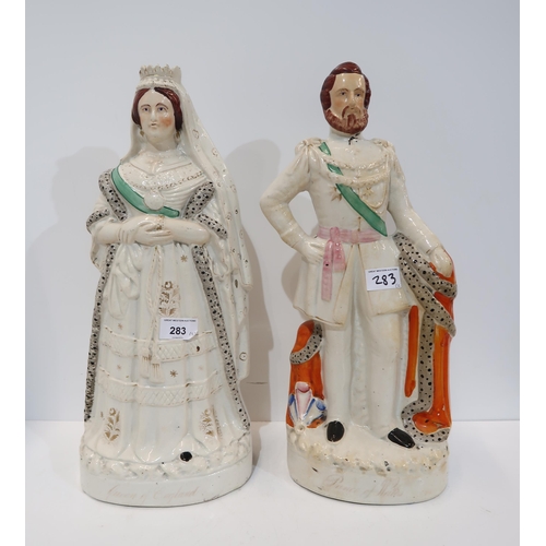 283 - A pair of large Staffordshire flatback figures of Queen Victoria and Prince Albert