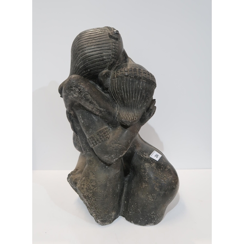 284 - A large Indian figure group of a couple embracing