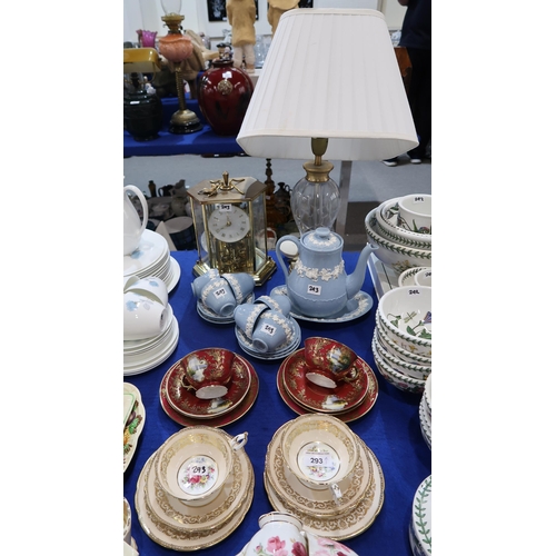 293 - A pair of Paragon trio's decorated with bouquets of flowers, a pair of Noritake trios with extra sau... 