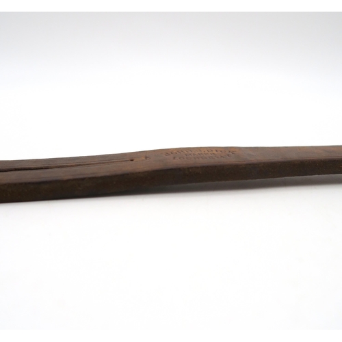 454 - A school tawse by John J. Dick of Lochgelly, of heavyweight leather