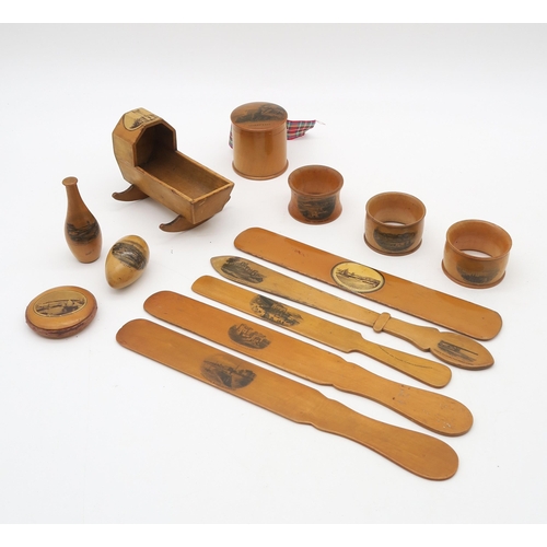 469 - Twenty-three articles of Mauchline ware, depicting largely English locations (Ramsgate, Yarmouth, Bo... 