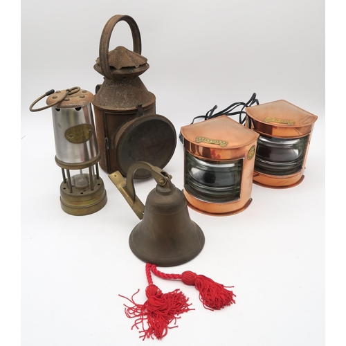 486 - A pair of small copper and brass ship's Port and Starboard lanterns by Buchan Supply Stores, Peterhe... 