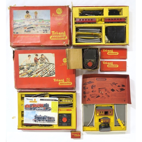 488 - Boxed Tri-ang 00-gauge model railway sets and components, comprising an R3.A Electric Railway set, R... 