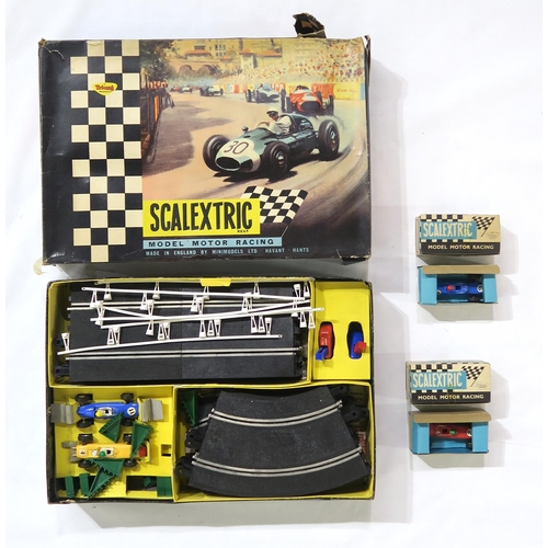 488 - Boxed Tri-ang 00-gauge model railway sets and components, comprising an R3.A Electric Railway set, R... 