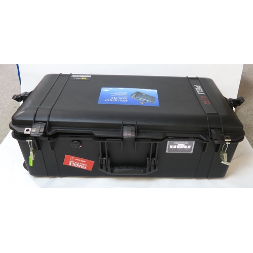 505 - A Peli 1615 Air case, containing a range of camera accessories, including a National PE-3057 flash, ... 