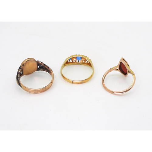 772 - An 18ct (af) gold blue gem and diamond chip ring, size S, weight 2.9gms, a 9ct gold carnelian set ri... 