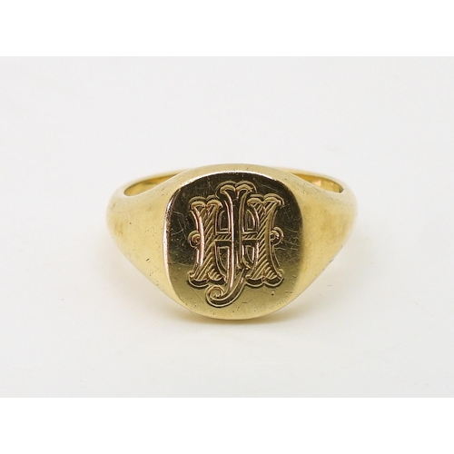 773 - A 9ct gold signet ring, size Q1/2, weight 6.8gms