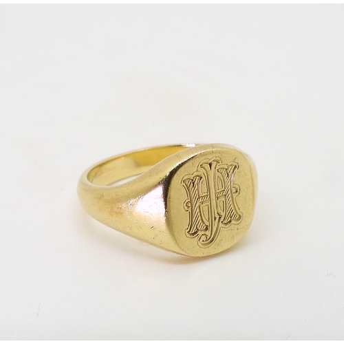 773 - A 9ct gold signet ring, size Q1/2, weight 6.8gms