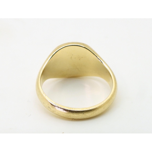 773 - A 9ct gold signet ring, size Q1/2, weight 6.8gms