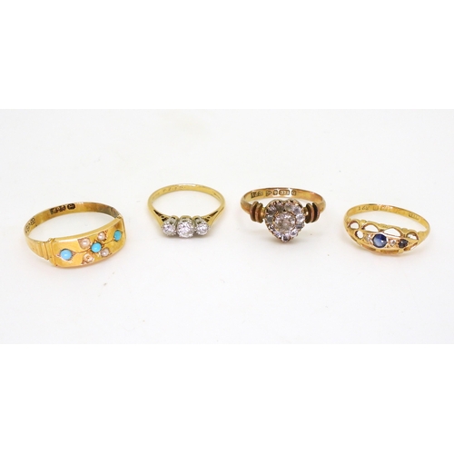 774 - Two 18ct gold rings, clear gem 3 stone K, size L1/2, blue gem and diamond chip L1/2, a 15ct gold tur... 