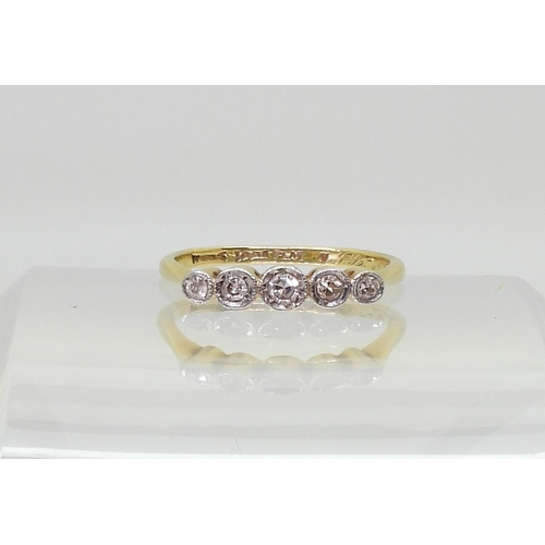 776 - An 18ct and platinum five stone diamond ring, size N1/2, set with estimated approx 0.15cts of eight ... 