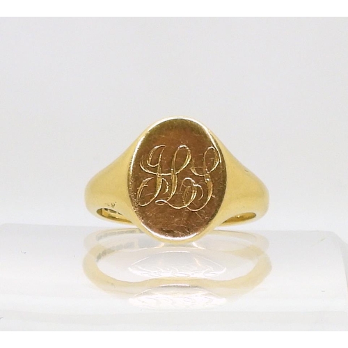 781 - A 18ct gold signet ring marked Birmingham 1963, size U, weight 10.4gms