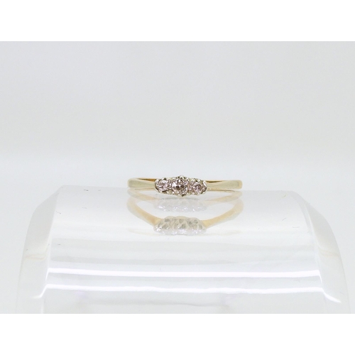 791 - An 18ct gold three stone diamond ring,set with estimated approx 0.12cts, size P1/2, weight 2.4gms