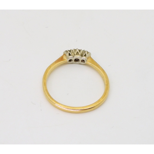 791 - An 18ct gold three stone diamond ring,set with estimated approx 0.12cts, size P1/2, weight 2.4gms