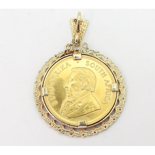 797 - A 1977 1oz fine gold Krugerrand coin in a 14k gold pendant mount, weight together 43.4gms