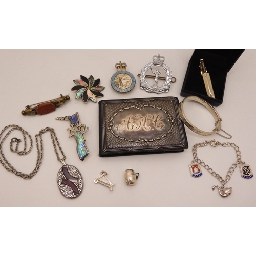 870 - A silver mounted early 20th century mini photo album, A Royal Observer Corps Sweetheart brooch and c... 