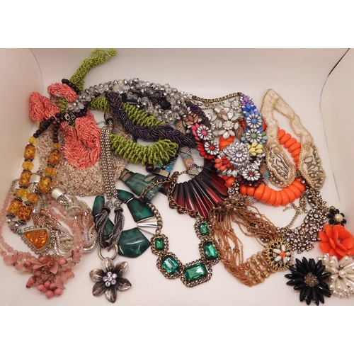 878 - A vintage beaded collar, made for Segal, and a collection of statement beaded and gem set necklaces