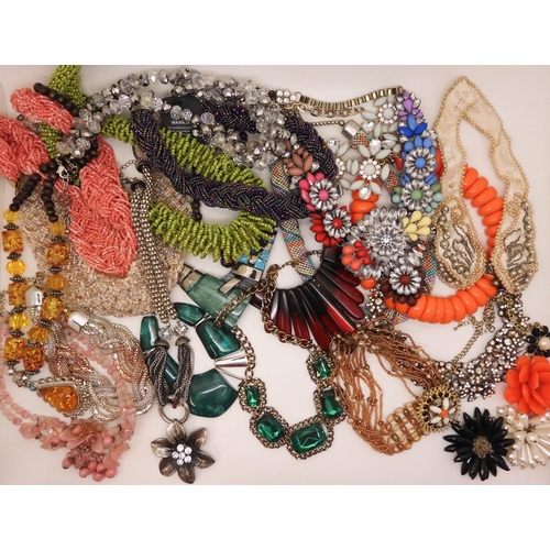 878 - A vintage beaded collar, made for Segal, and a collection of statement beaded and gem set necklaces