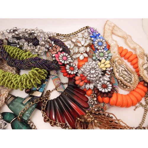 878 - A vintage beaded collar, made for Segal, and a collection of statement beaded and gem set necklaces