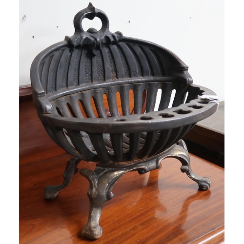 101 - An early 20th century cast iron fire basket, 41cm high x 39cm wide x 34cm deep