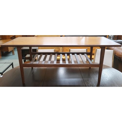 113 - A mid 20th century teak coffee table with rectangular top on square tapering supports joined by slat... 