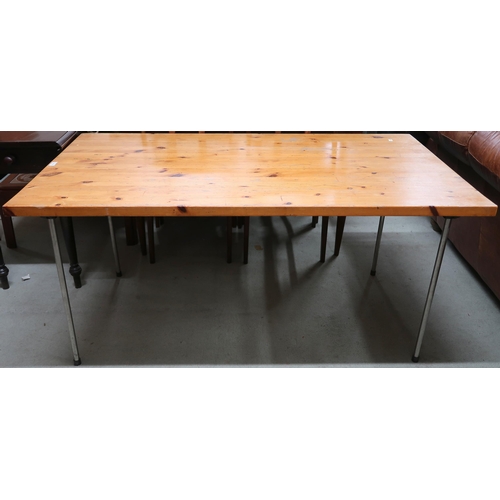 115 - A contemporary pine topped work table on metallic supports, 71cm high x 153cm long x 83cm deep